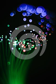 Abstraction of green threads of a fiber optic night-lamp.