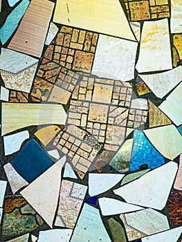 Abstractions style, grunge background with the wild chaotic broken mosaic ceramic tiles