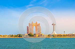 Abu Dhabi cityescape  and Al Marina island and mall  during golden hour  in UAE capital of United Arab Emirates