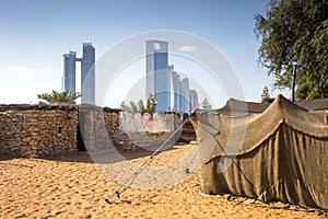 Abu Dhabi Historical Village and modern skyscrapers, Abu Dhabi, UAE