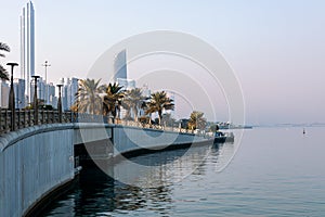 Abu Dhabi Skyline from Corniche. Abu Dhabi, Modern Skyscrapers and Landmark. Promenade in Abu Dhabi. United Arab Emirates, Middle