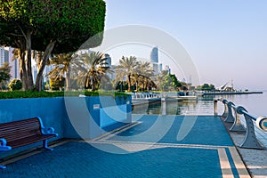 Abu Dhabi Skyline from Corniche. Abu Dhabi, Modern Skyscrapers and Landmark. Promenade in Abu Dhabi. United Arab Emirates, Middle