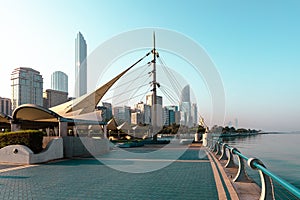 Abu Dhabi Skyline from Corniche. Abu Dhabi, Modern Skyscrapers and Landmark. Promenade in Abu Dhabi. United Arab Emirates, Middle