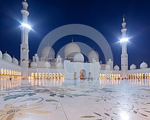 Abu Dhabi, UAE - March 26, 2014: Sheikh Zayed Grand Mosque in Abu Dhabi at dusk, UAE. Grang Mosque in Abu Dhabi is the largest