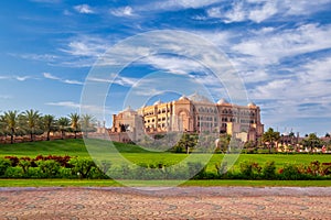 Abu Dhabi, UAE - March 29, 2014: Emirates Palace and gardens in Abu Dhabi, UAE. Five stars Emirates Palace is the second most