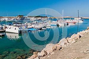 ABU DHABI, UAE - MARCH 7, 2017: Boats in Marina Breakwater, United Arab Emirat