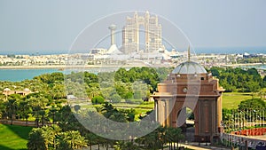 Abu Dhabi, United Arab Emirates - December 4, 2023: Aerial view of gate to the Emirates Palace hotel and Rixos hotel on
