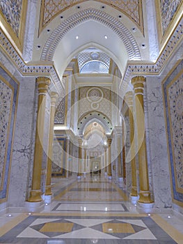 ABU DHABI, UNITED ARAB EMIRATES - Feb 10, 2020: Qasr Al Watan presidential palace in Abu Dhabi, gold and marble hallway decor