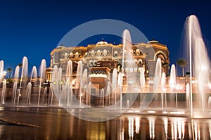 Abu Dhabi, United Arab Emirates - November 1, 2019: Emirates palace in Abu dhabi reflected on the ground level fountain