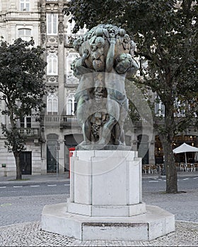 The Abundancia Os Meninos sculpture by Henrique Moreira on Avenida dos Aliados in Porto, Portugal. photo