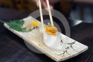 Aburi engawa sushi - Grilled flatfish Fluke fin on rice toppin
