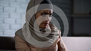 Abused arab female thinking of troubles, desperate woman worrying, anxiety