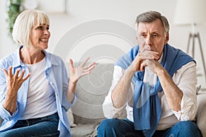 Abusive relationship. Angry woman shouting at husband