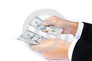 Ac Business Money dollars in the hands on a white background