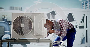 AC Electrician Technician Repairing Air Conditioner