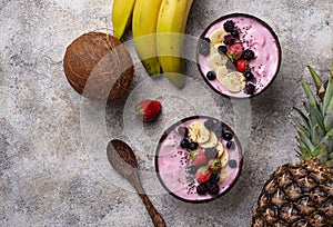 Acai bowl in coconut plate.