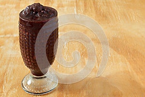 Acai frozen pulp juice in glass