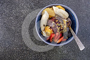 Acai fruit bowl in a blue dish