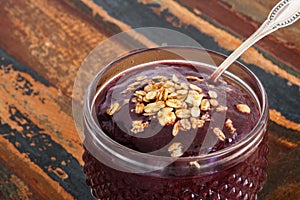 Acai pulp juice in glass photo