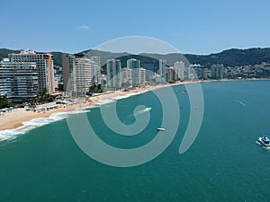 Acapulco Beach Hotels line in sunny day