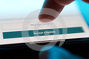Accept cookies button on internet webpage on smartphone. Internet browsing history data technology security concept