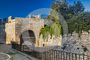 The access arch through the ancient defensive walls of the city