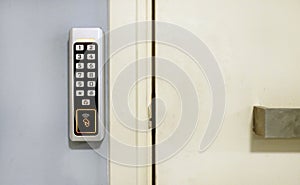 Access control with a passcode - combination lock next to a locked door