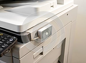 Access control for scanning key card to access Photocopier