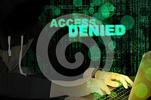 Access denied - hacker and laptop with code background