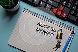 Access Denied write on a book isolated on office desk