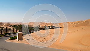 Access through dunes to Desert Hotel, Abu Dhabi. Qasr Al Sarab Resort and Hotel, Abu Dhabi, United Arab Emirates