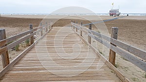 Access ocean sandy pathway fence wooden to mediterranean sea beach coast at Gruissan France