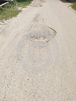 Access to rural roads with potholes means you have to be careful when crossing the area