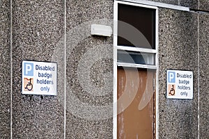 Accessible parking sign at school for disabled drivers