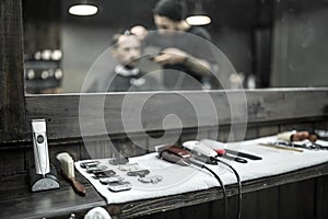 Accessories of hairdresser in barbershop