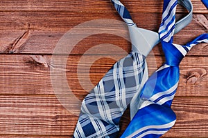 Accessories for men. colorful ties on a wooden background. concept of happy father`s day or shoppig
