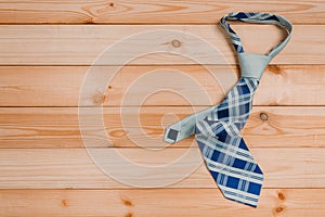 Accessories for men. colorful ties on a wooden background. concept of happy father`s day or shoppig