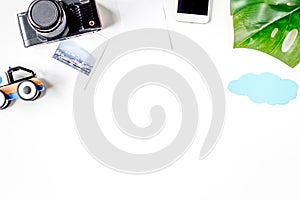 Accessories for treveling with children and mobile phone on white background top view mock-up