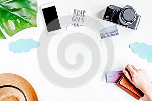 Accessories for treveling with children and mobile phone on white background top view mock-up