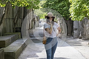 Accessorized woman walking in the park