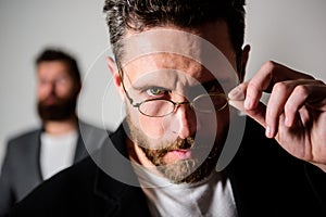 Accessory for smart appearance. Now i see everything. Attentive glance. Picky smart inspector. Man handsome bearded guy