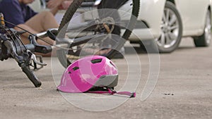Accident bicycle crashes car after stunt on street.