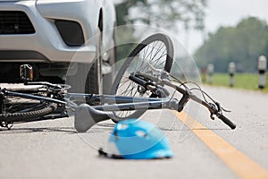 Accident car crash with bicycle on road