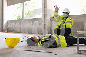 An accident of a man worker at the construction site and call to the safety officer for rescue and Life-saving. Selection focus on