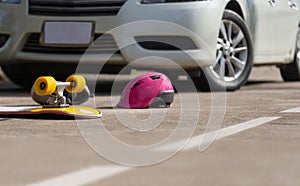 Accident skateboard crashes car after stunt on street.