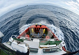 Accommodation barge during sunset at sea