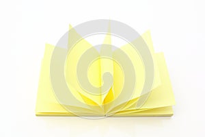 accordion Block of yellow Post it Notes isolated