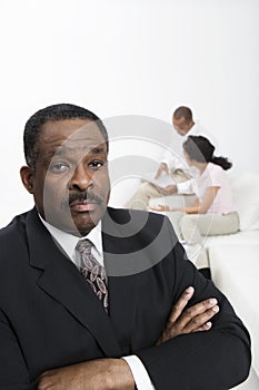 Accountant With Couple In Background
