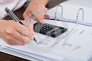 Accountant Doing Calculation photo