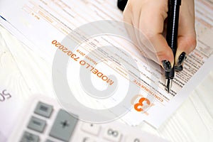 Accountant fill italian tax form Modello 730 individual income tax return in end of tax period. Taxation and paperwork